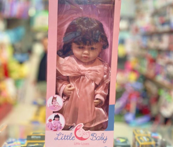 عروسک سیلیکونی دختر بچه 50 سانتی سخنگو با کلاه صورتی_اسباب بازی