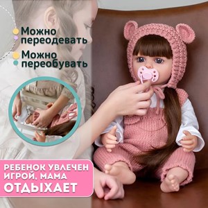 عروسک سیلیکونی دختر بچه همراه با لباس بافتنی و وسایل_اسباب بازی