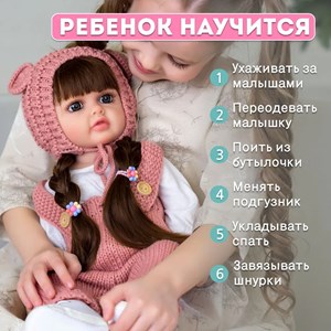 عروسک سیلیکونی دختر بچه همراه با لباس بافتنی و وسایل_اسباب بازی